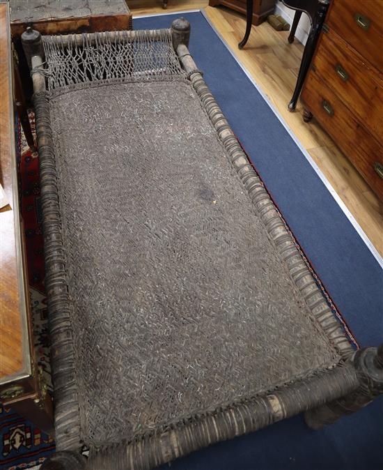 An African day bed L.190cm